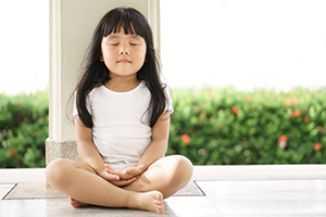Little girl practising mindfulness