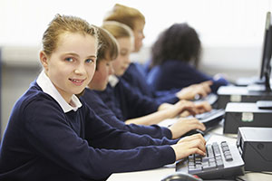 School children using computers to get online