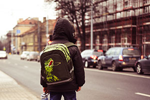 road safety - a child ready to cross the road