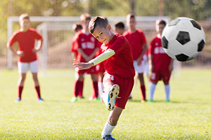 children playing football