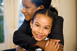 Foster carer with young girl