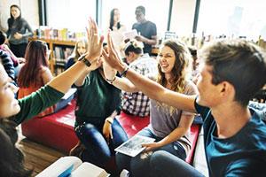 Pupils highfiving positive mental health