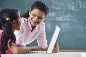 Young teacher with little girl - Wellbeing and the benefits of SCITT buy-in