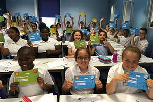 Student from Tudor Court taking the Primary Mathematics Challenge