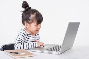 Little girl on laptop