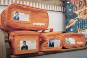 Medpac packs piled up on a shelf