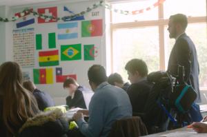 A teacher in a classroom of pupils