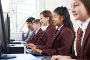 School pupils sitting at computers