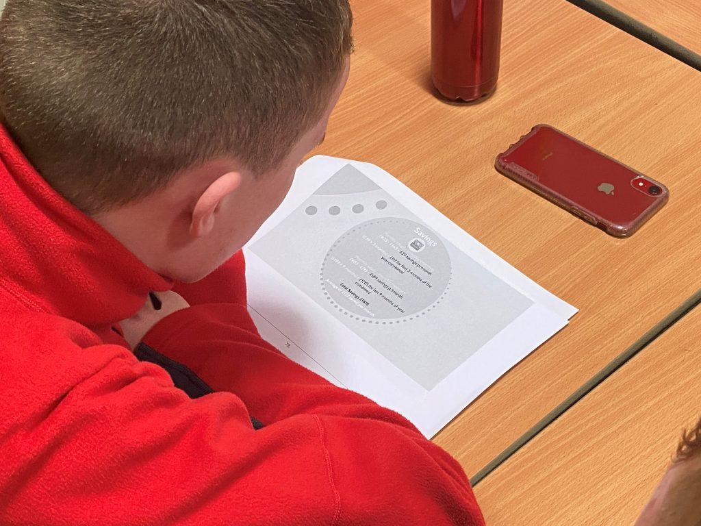 A boy studying school work