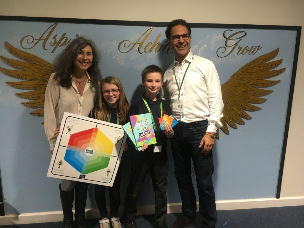 L-R) Kathy Clarke (Mental Health Team Lead at Red Oaks Primary School), Yr 6 peer mentors Elsie and Toby, and Nadim Saad (Founder of the Happy Confident Company)