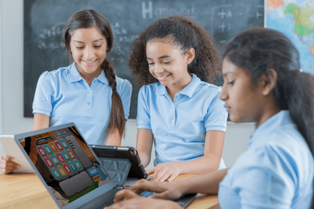 School children playing the Word Mania game