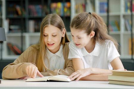 World Book Day. Two children reading